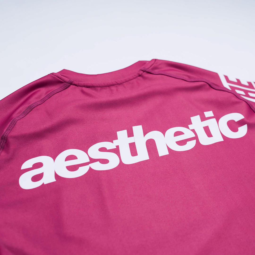AESTHETIC Axis Short Sleeve Rashguard - Ruby Red back close up details
