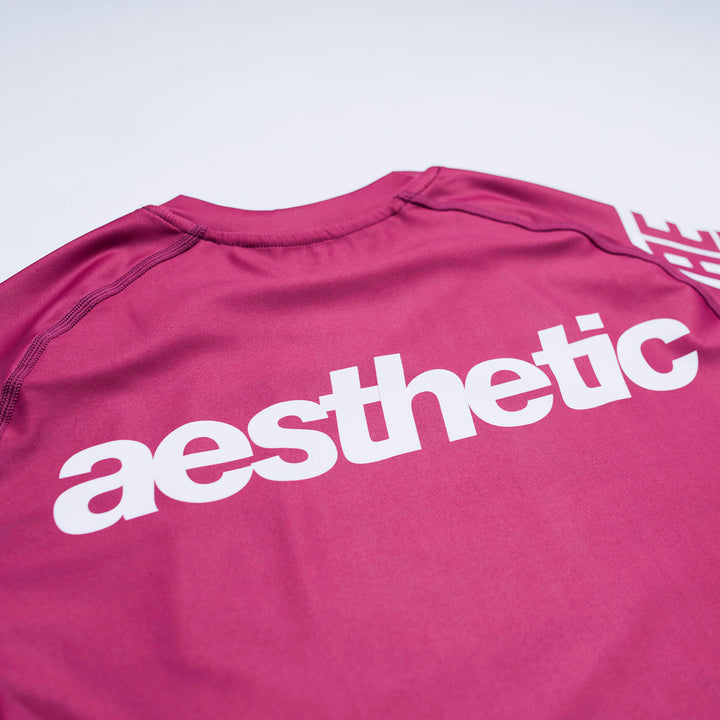 AESTHETIC Axis Short Sleeve Rashguard - Ruby Red back close up details
